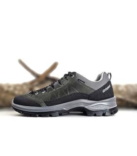 vista lateral zapatillas montaña impermeables hombre