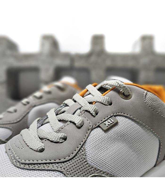 detalle material textil zapatillas casual xti