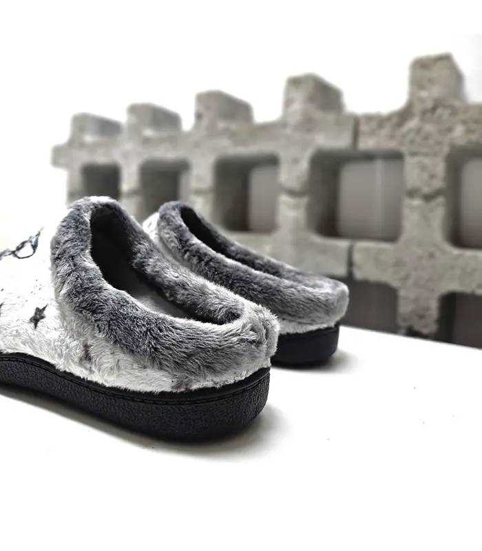 Vista trasera de zapatillas destalonadas Plumaflex mujer con ribete afelpado gris y piso negro