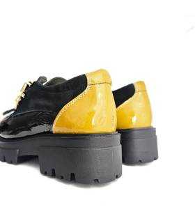Talonera amarilla de charol en zapato Nival mujer de invierno