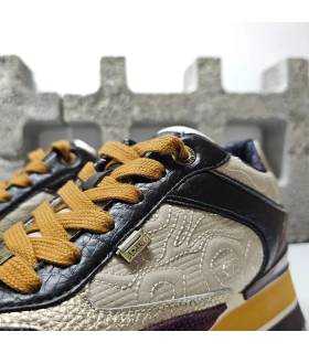 Detalle zapatillas Anekke London mujer cordones mostaza texturas laterales