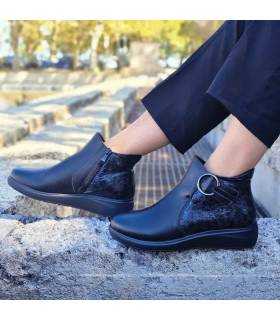 Botines Treinta’s mujer con cuña y animal print negro puestos
