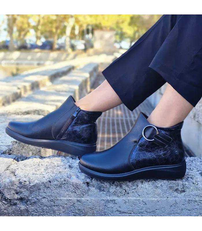Botines Treinta’s mujer con cuña y animal print negro puestos