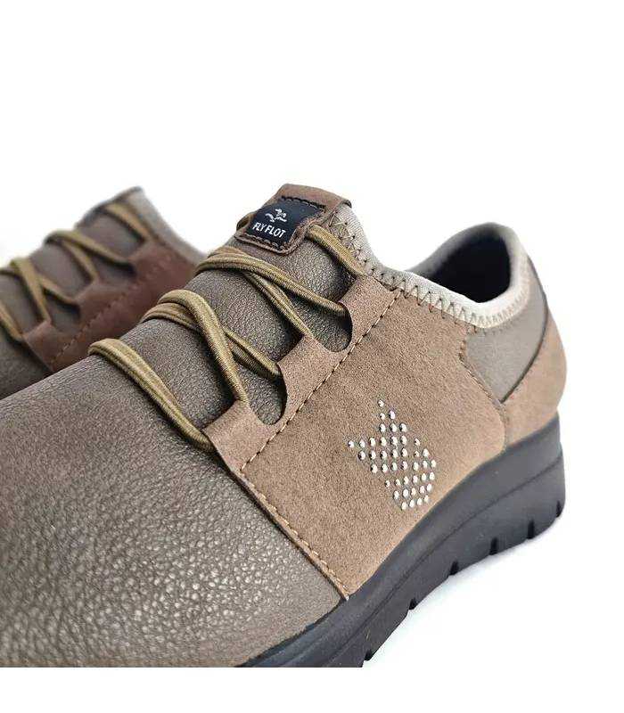 Detalle zapatos FlyFlot mujer beige cordones elásticos