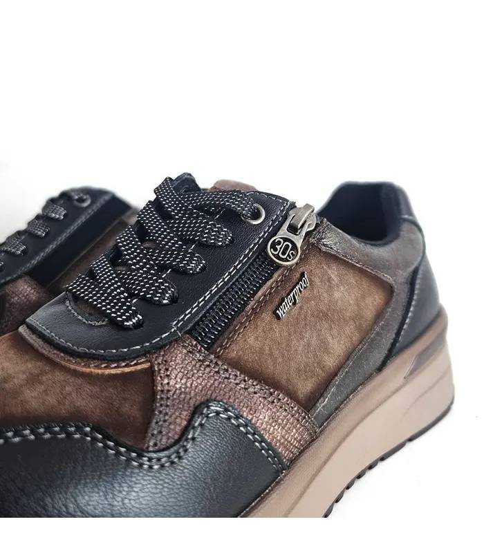 Detalle cremallera Treintas mujer waterproof marrón