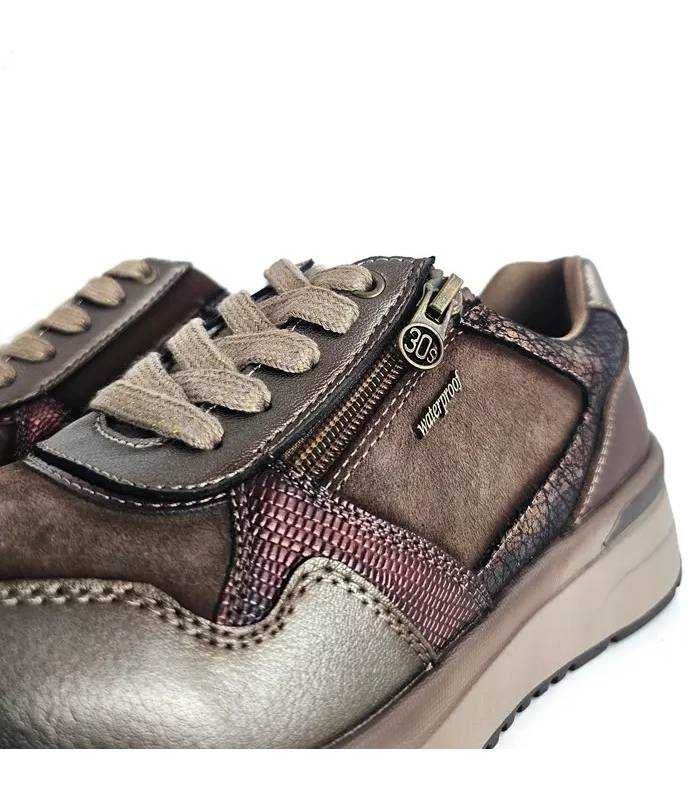 Detalle cremallera zapatos mujer impermeables Treintas