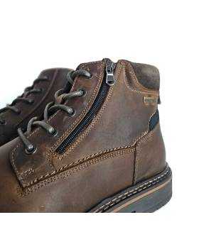 Detalle cremallera bota Output by Girza hombre piel marrón