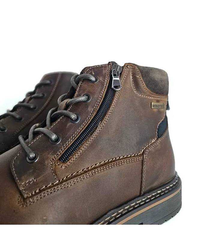 Detalle cremallera bota Output by Girza hombre piel marrón