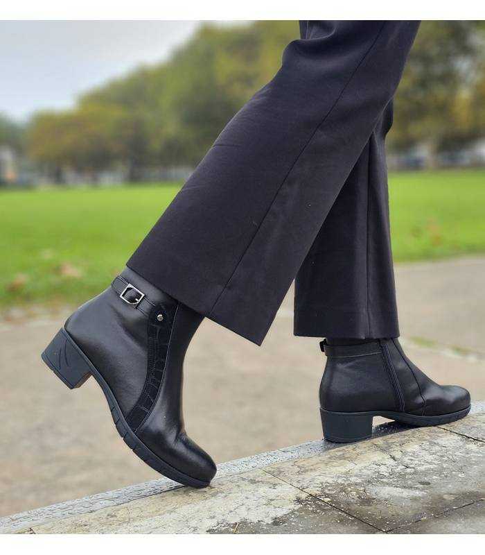 Botines Treintas mujer piel negra con tacón bajo puestos